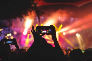 live streaming music festival on a mobile phone in the crowd - jawbone virtual event live stream activation